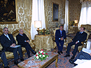 With the prime minister Selvio Berlusconi
