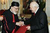 Fares receives the Papal Bull from the Patriarch